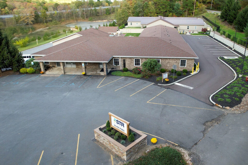 Drone view of the front entrance at STR Behavioral Health Silver Pines detox and residential treatment center for addiction and mental health disorders.