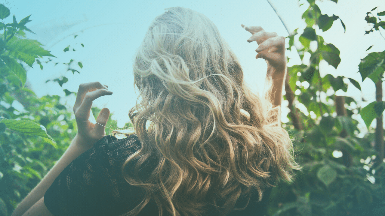 STR - Blog Image - young woman with long blonde hair in field