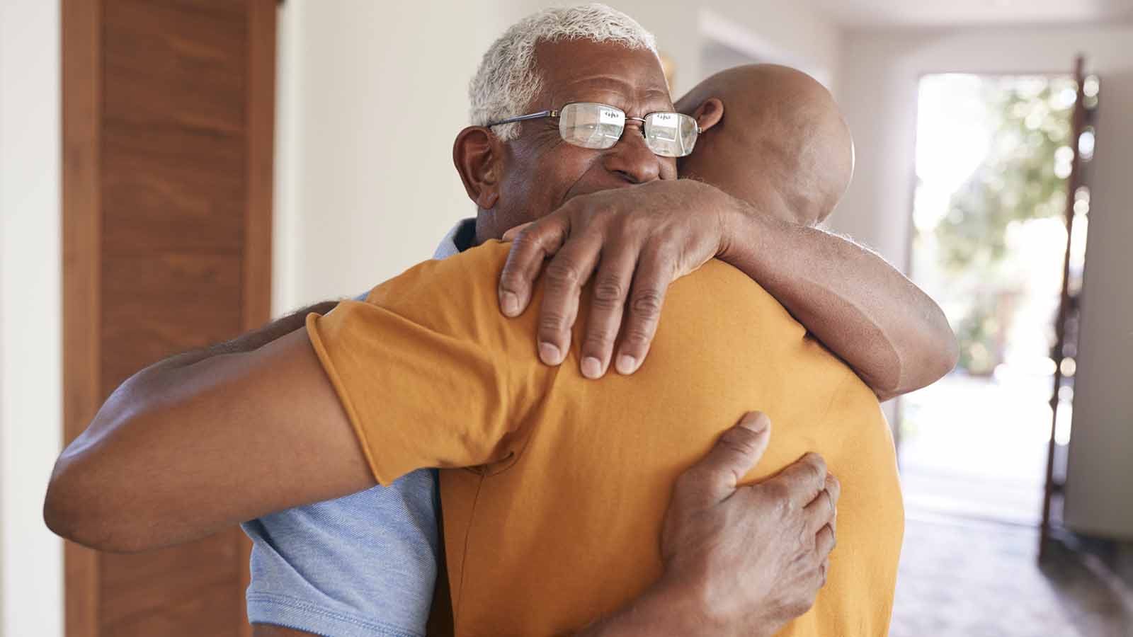 father-hugging-son