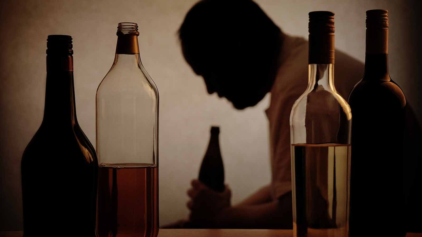 silhouette-of-man-drinking